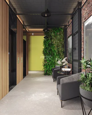 A sala de estar apresenta um design moderno com paredes de tijolo e jardim vertical.