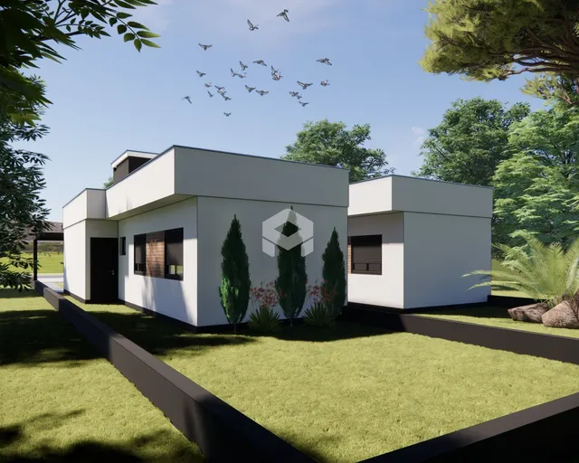 Fachada moderna de uma residência em Lajeado, Brasil, com jardim gramado.