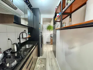 Vista da cozinha e corredor de um imóvel em Lajeado, Brasil.
