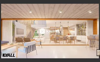 Sala de estar moderna com área de jantar e cozinha em um apartamento.