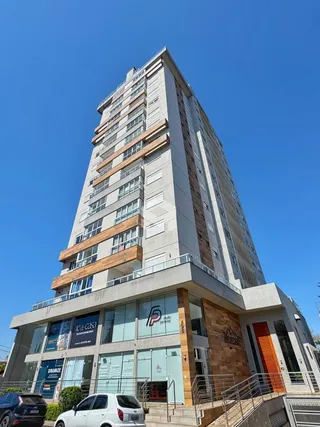 fachada de um prédio residencial em Lajeado, Brasil sob céu azul.