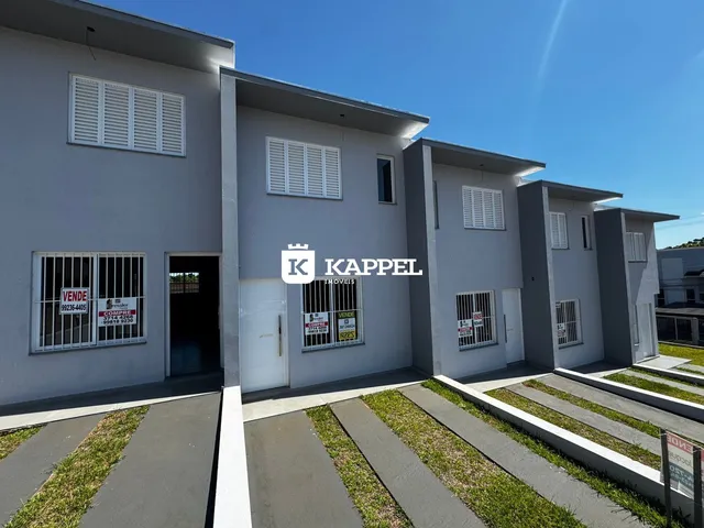 Fachada externa de um prédio residencial moderno em Lajeado, Brasil.