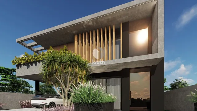 Fachada moderna de uma residência em Lajeado, Brasil, com elementos de madeira e vidro.