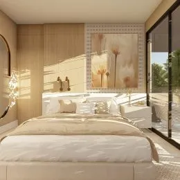 Quarto com cama grande e decoração neutra em um imóvel.