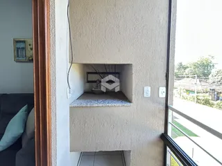 Detalhe da parede interna de uma residência em Lajeado, Brasil, mostrando uma abertura na alvenaria.