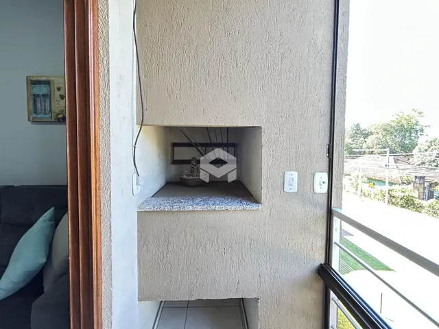 Detalhe da parede interna de uma residência em Lajeado, Brasil, mostrando uma abertura na alvenaria.
