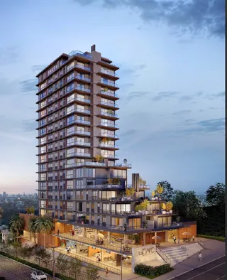 Fachada de um edifício residencial moderno com vários andares em Lajeado.