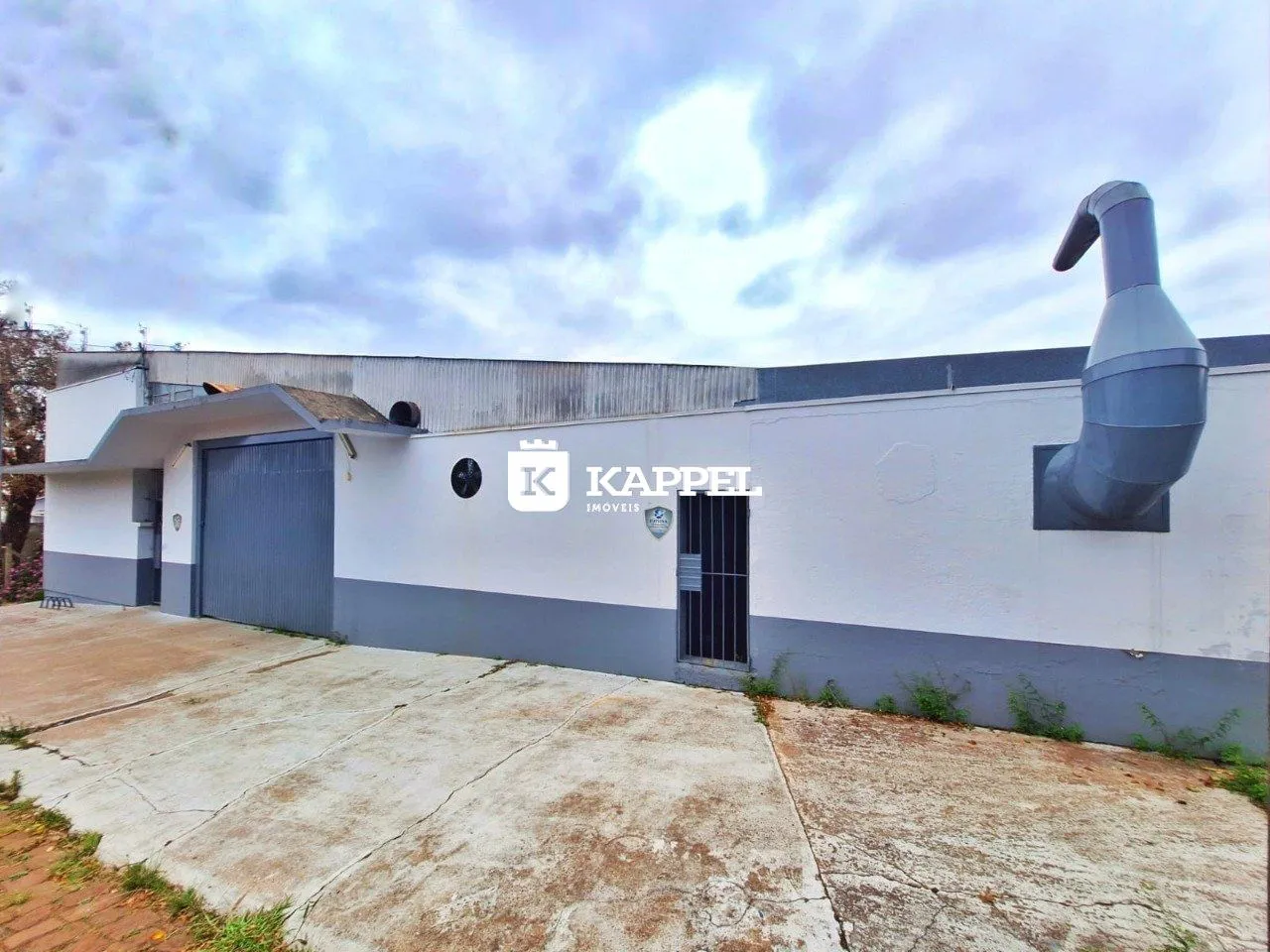 Foto da fachada externa de uma residência em Lajeado, Brasil.