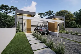 Fachada moderna de uma residência em Lajeado, Brasil, com paisagismo frontal.