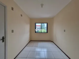 Corredor interno de um imóvel em Lajeado, Brasil.