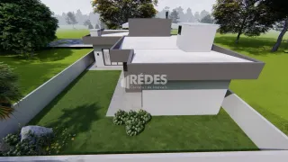 Fachada moderna de uma residência com jardim em Lajeado.