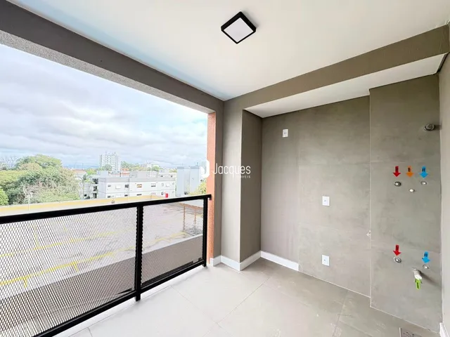 Vista da área externa da propriedade em Lajeado, Brasil com grade de segurança.