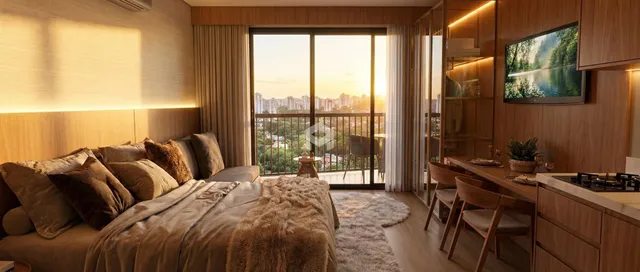 Quarto com vista para a cidade e decoração moderna.