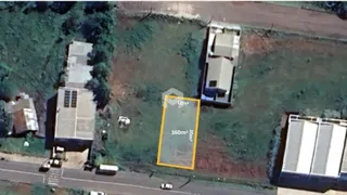 Vista aérea de um lote residencial em Lajeado, Brasil, mostrando as construções e a área circundante.