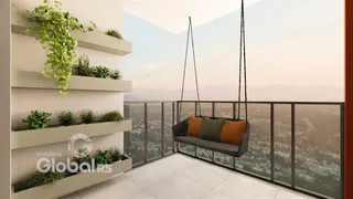 Uma varanda com vista panorâmica para a paisagem.