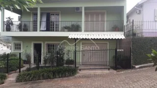 Casa com 4 dormitórios, foto 1