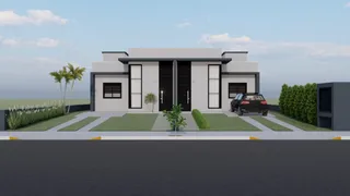 Fachada moderna de uma residência em Lajeado, Brasil, com paisagismo frontal.