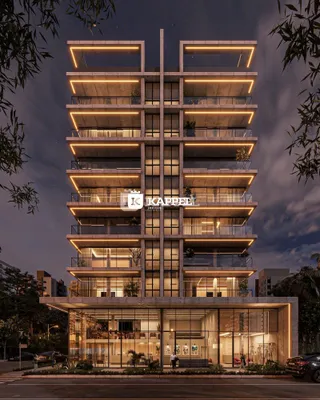 Fachada moderna de um prédio residencial em Lajeado, Brasil, com iluminação de destaque.