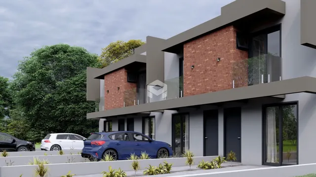 Fachada de uma residência moderna com detalhes em tijolo aparente em Lajeado.