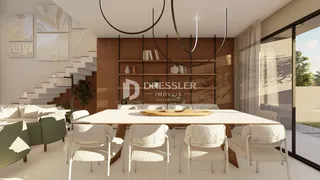 Ambiente moderno com mesa de jantar e decoração em um imóvel.