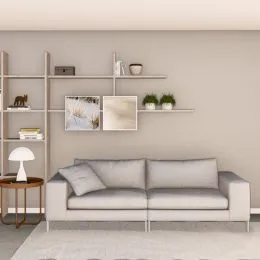 Sala de estar com sofá e prateleiras de parede.
