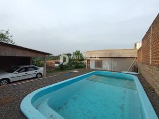 Foto da piscina externa de uma propriedade em Lajeado.