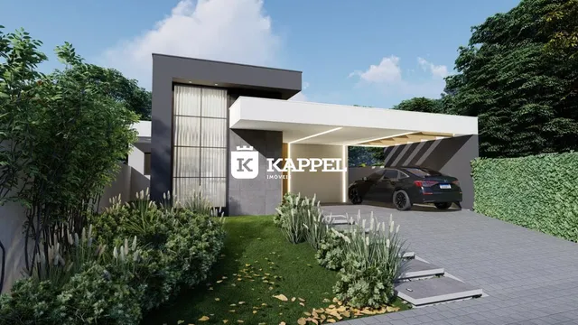 Fachada moderna de uma residência em Lajeado, com paisagismo verde e área de garagem coberta.