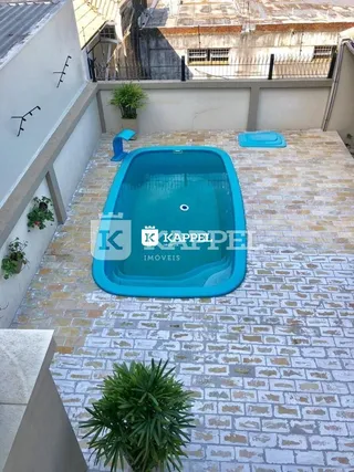 Foto de uma piscina externa em um pátio de um imóvel em Lajeado.