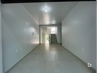 Corredor interno de uma residência em Lajeado.