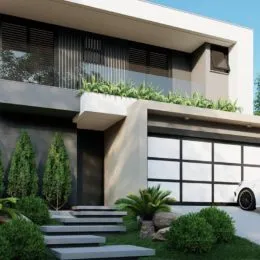 Fachada moderna de uma residência com jardim na Lajeado.