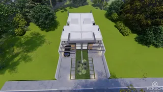 Fachada moderna de uma casa em Lajeado, Brasil, com jardim verde bem cuidado.