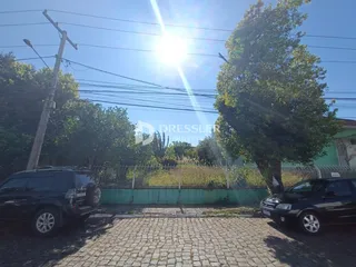Vista externa da propriedade em Lajeado, Brasil, mostrando o quintal e a cerca.