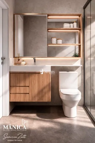 Banheiro com bancada de madeira e vaso sanitário branco.