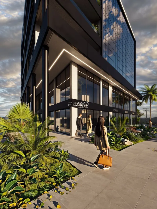 Fachada moderna de um edifício residencial em Lajeado, Brasil, com paisagismo tropical.