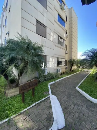 Vista externa do jardim e caminho de uma propriedade em Lajeado.