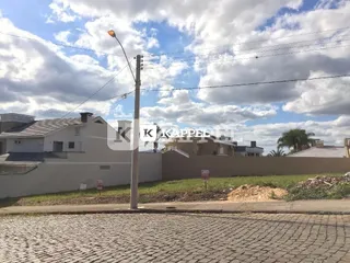 Foto da fachada de uma residência em Lajeado, Brasil, mostrando o muro e o entorno.