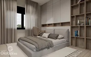 Quarto moderno com cama e armário em um apartamento.