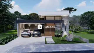 Fachada moderna de uma residência com paisagismo e área de garagem em Lajeado.
