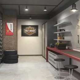 Ambiente interno com parede de tijolo aparente e piso claro.