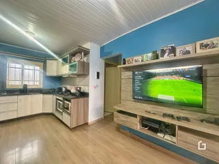 Foto de uma sala de estar com cozinha integrada em Lajeado, Brasil.