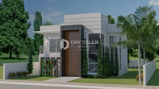 Fachada de uma casa moderna com jardim verde em Lajeado, Brasil.