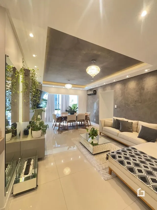 Sala de estar moderna com piso claro e sofá.