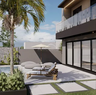 Foto da área de piscina e jardim de uma residência moderna em Lajeado.