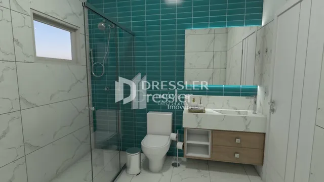 Foto de um banheiro com revestimento de azulejo branco e box de vidro.