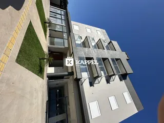 Fachada externa de um edifício residencial moderno em Lajeado, Brasil.