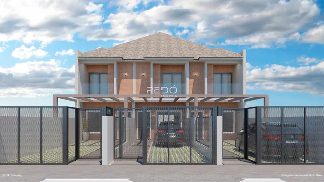 Fachada de uma residência com portão de metal em Lajeado, Brasil.