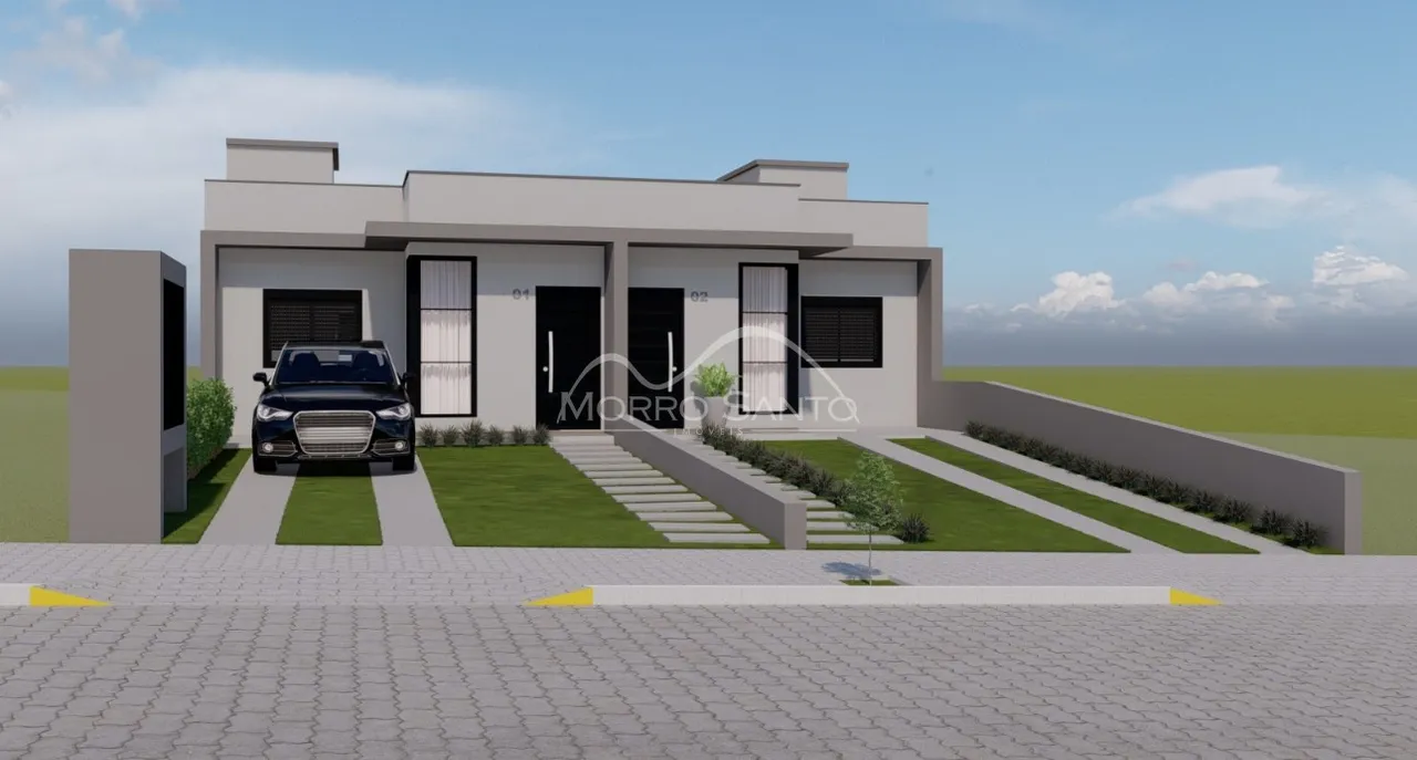 Fachada frontal de uma casa moderna em Lajeado, Brasil, com jardim e acesso de carro.
