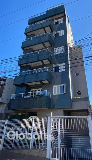 Fachada de um prédio residencial em Lajeado, Brasil com varandas.