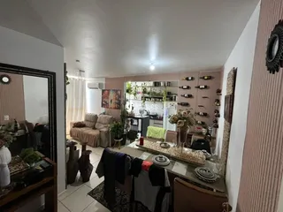 Sala de estar e cozinha de uma residência em Lajeado, Brasil.