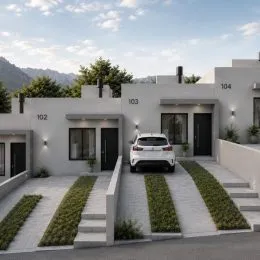 Fachada de uma residência moderna em Lajeado, Brasil, com acesso por uma entrada pavimentada.